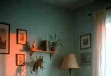 How Mindfulness Meditation Helps You Find Lasting Peace a slightly messy American living room at dawn, a half-burnt candle on a coffee table, and a meditation cushion with visible wear.